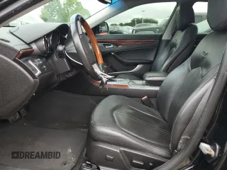 2012 Cadillac CTS Luxury with VIN 1G6DG5E54C0158220, listed as a Copart auction lot 58929735 with 107,667 mi miles and Salvage title. Bid and sale history available at DreamBid. Image 7.