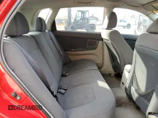 2005 Kia Spectra with VIN KNAFE162255129620, listed as a Copart auction lot 86822464 with 249,516 mi miles and Salvage Title. Bid and sale history available at carsss.com. Image 10.