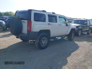 2006 Hummer H3 with VIN 5GTDN136X68140150, listed as a IAAI auction lot 42179537 with 199,593 mi miles. Bid and sale history available at carsss.com. Image 4.