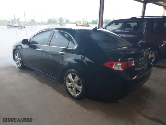 2009 Acura TSX with VIN JH4CU26629C004182, listed as a IAAI auction lot 42086811 with 206,526 mi miles. Bid and sale history available at carsss.com. Image 3.