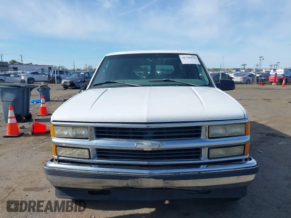 1997 Chevrolet Suburban with VIN 3GNFK16R4VG126095, listed as a IAAI auction lot 41548470 with 290,502 mi miles. Bid and sale history available at carsss.com. Image 6.