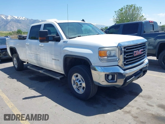 2016 GMC Sierra 2500HD SLE z VIN 1GT12SEG9GF180988, wystawiony jako IAAI lot #42321220 z przebiegiem 195 188 mil mil oraz . Historia ofert i sprzedaży dostępna na DreamBid. Obrazek 1.