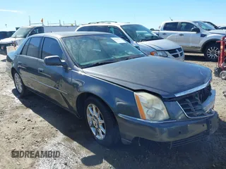 2011 Cadillac DTS Premium Collection z VIN 1G6KH5E68BU124852, wystawiony jako IAAI lot #41652793 z przebiegiem 227 148 mil mil oraz . Historia ofert i sprzedaży dostępna na DreamBid. Obrazek 1.
