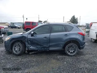 2013 Mazda CX-5 Sport with VIN JM3KE2BE7D0154040, listed as a IAAI auction lot 41842013 with 132,382 mi miles. Bid and sale history available at carsss.com. Image 14.