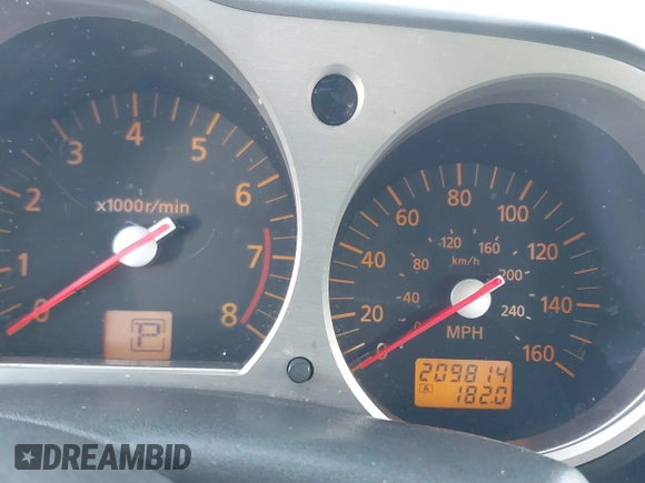 2004 Nissan 350Z Touring with VIN JN1AZ34E84T060682, listed as a IAAI auction lot 41616199 with 209,814 mi miles. Bid and sale history available at carsss.com. Image 7.