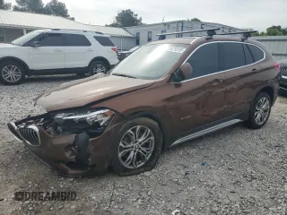 2016 BMW X1 xDrive28i z VIN WBXHT3C38G5E56199, wystawiony jako Copart lot #54210195 z przebiegiem Nie podano mil oraz Szkoda całkowita • Salvage title. Historia ofert i sprzedaży dostępna na DreamBid. Obrazek 1.