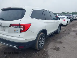 2019 Honda Pilot EX-L with VIN 5FNYF6H52KB025930, listed as a IAAI auction lot 42117673 with 84,721 mi miles and . Bid and sale history available at DreamBid. Image 4.