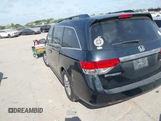 2015 Honda Odyssey EX-L with VIN 5FNRL5H68FB094983, listed as a IAAI auction lot 42031539 with 231,144 mi miles and . Bid and sale history available at DreamBid. Image 3.