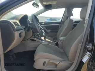 2010 Volkswagen Jetta S with VIN 3VWJX7AJ0AM010023, listed as a Copart auction lot 52379285 with 124,881 mi miles and Salvage title. Bid and sale history available at DreamBid. Image 7.