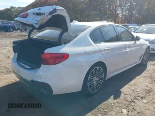 2018 BMW 5 Series 530i xDrive with VIN WBAJA7C58JG907988, listed as a IAAI auction lot 38011708 with Not provided miles and . Bid and sale history available at DreamBid. Image 4.