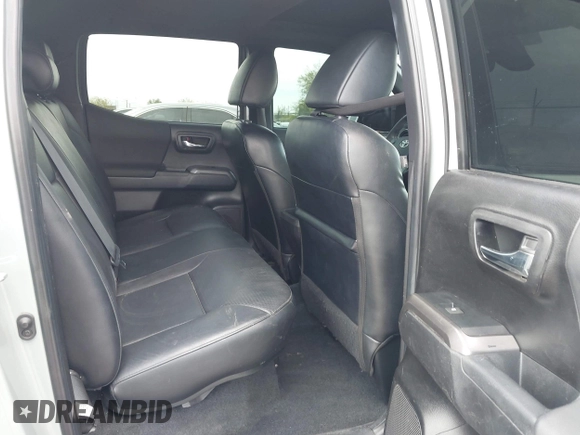 2022 Toyota Tacoma SR with VIN 3TMCZ5AN0NM507320, listed as a IAAI auction lot 42220296 with 33,342 mi miles and . Bid and sale history available at DreamBid. Image 8.