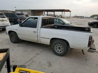 1990 Nissan Frontier z VIN 1N6SD11S8LC377906, wystawiony jako Copart lot #54840925 z przebiegiem 131 024 mil mil oraz Szkody całkowita. Historia ofert i sprzedaży dostępna na DreamBid. Obrazek 2.