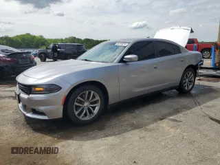 2015 Dodge Charger SXT z VIN 2C3CDXHG9FH862721, wystawiony jako Copart lot #54249015 z przebiegiem 192 612 mil mil oraz Szkody całkowita. Historia ofert i sprzedaży dostępna na DreamBid. Obrazek 1.