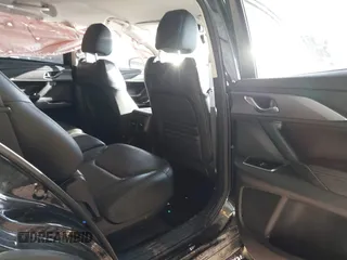 2016 Mazda CX-9 Touring with VIN JM3TCACY8G0102157, listed as a IAAI auction lot 41670673 with 87,796 mi miles and . Bid and sale history available at carsss.com. Image 8.