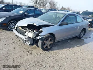 2005 Honda Civic LX with VIN 1HGEM215X5L064781, listed as a IAAI auction lot 41443405 with 303,293 mi miles. Bid and sale history available at carsss.com. Image 2.