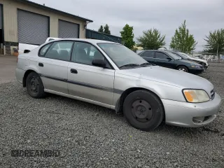 2002 Subaru Legacy L with VIN 4S3BE635727213302, listed as a Copart auction lot 58575235 with 243,886 mi miles and Salvage title. Bid and sale history available at DreamBid. Image 4.