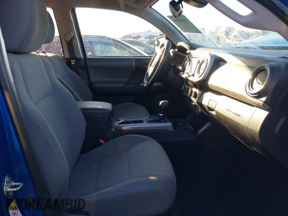 2018 Toyota Tacoma SR with VIN 3TMCZ5AN3JM138480, listed as a IAAI auction lot 41080910 with 99,225 mi miles. Bid and sale history available at carsss.com. Image 5.