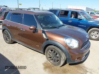 2013 MINI Countryman S ALL4 with VIN WMWZC5C58DWP30998, listed as a IAAI auction lot 42594984 with 153,792 mi miles and . Bid and sale history available at DreamBid. Image 1.
