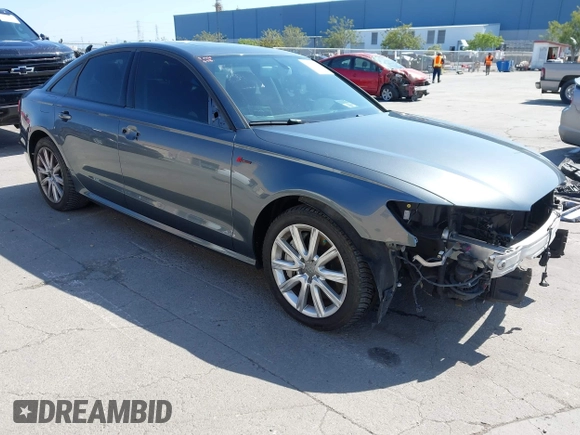 2014 Audi A6 3.0T Prestige with VIN WAUHGAFC9EN028196, listed as a IAAI auction lot 41993806 with 100,215 mi miles. Bid and sale history available at carsss.com. Image 1.