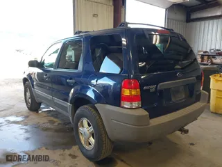 2002 Ford Escape XLT with VIN 1FMCU031X2KA37050, listed as a IAAI auction lot 42024674 with 199,249 mi miles. Bid and sale history available at carsss.com. Image 3.