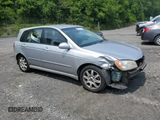 2005 Kia Spectra z VIN KNAFE162755170129, wystawiony jako Copart lot #60217065 z przebiegiem 94 458 mil mil oraz Szkoda całkowita • Salvage title. Historia ofert i sprzedaży dostępna na DreamBid. Obrazek 4.