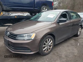 2015 Volkswagen Jetta Sedan 1.8T SE with VIN 3VWD17AJ2FM403107, listed as a IAAI auction lot 41849921 with 103,990 mi miles. Bid and sale history available at carsss.com. Image 2.