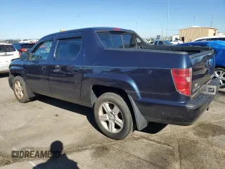 2009 Honda Ridgeline RTL with VIN 2HJYK16559H500181, listed as a Copart auction lot 74242164 with 81,888 mi miles and Salvage Title. Bid and sale history available at carsss.com. Image 2.