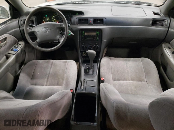 2000 Toyota Camry CE z VIN JT2BG22K1Y0483646, wystawiony jako Copart lot #53129705 z przebiegiem 187 418 mil mil oraz Szkoda całkowita • Salvage title. Historia ofert i sprzedaży dostępna na DreamBid. Obrazek 8.
