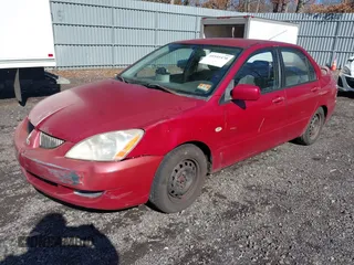 2005 Mitsubishi Lancer ES with VIN JA3AJ26E55U031209, listed as a IAAI auction lot 41541470 with 290,334 mi miles. Bid and sale history available at carsss.com. Image 2.