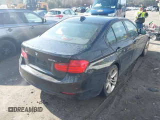 2014 BMW 3 Series 328i xDrive with VIN WBA3B5C50EP542898, listed as a IAAI auction lot 41867425 with 169,014 mi miles and . Bid and sale history available at DreamBid. Image 4.