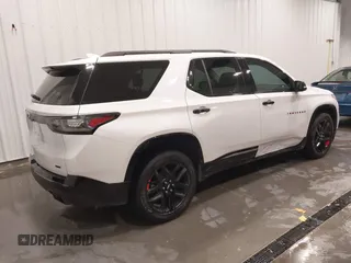 2018 Chevrolet Traverse Premier z VIN 1GNEVJKW4JJ163087, wystawiony jako IAAI lot #41509692 z przebiegiem 118 158 mil mil oraz . Historia ofert i sprzedaży dostępna na DreamBid. Obrazek 4.
