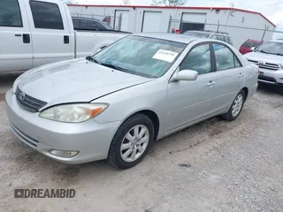 2003 Toyota Camry LE with VIN 4T1BE30K13U168509, listed as a IAAI auction lot 42220735 with 210,328 mi miles and . Bid and sale history available at DreamBid. Image 2.