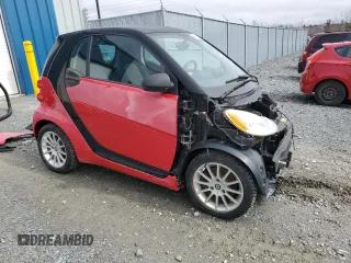 2011 Smart fortwo Pure z VIN WMEEJ3BA5BK487747, wystawiony jako Copart lot #49703445 z przebiegiem 93 489 mil mil oraz Szkoda całkowita • Salvage title. Historia ofert i sprzedaży dostępna na DreamBid. Obrazek 4.