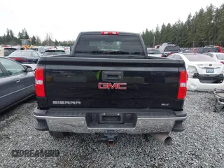 2018 GMC Sierra 2500HD SLT with VIN 1GT12TEY4JF203731, listed as a IAAI auction lot 41858306 with 86,931 mi miles. Bid and sale history available at carsss.com. Image 17.