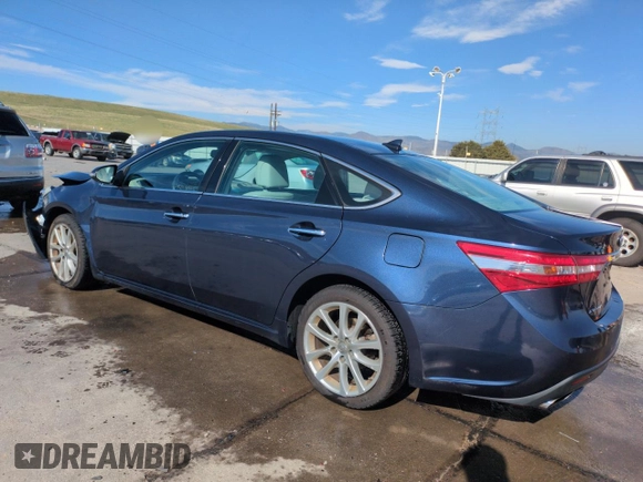 2014 Toyota Avalon Limited with VIN 4T1BK1EB5EU111304, listed as a Copart auction lot 52227635 with 133,805 mi miles and Salvage Title. Bid and sale history available at carsss.com. Image 2.