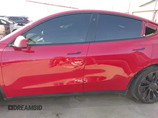 2022 Tesla Model Y Performance z VIN 7SAYGDEF0NF518740, wystawiony jako IAAI lot #41785358 z przebiegiem 50 692 mil mil oraz . Historia ofert i sprzedaży dostępna na DreamBid. Obrazek 15.