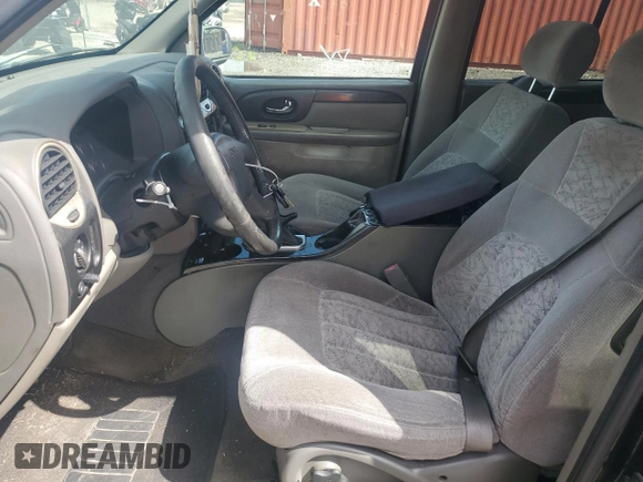 2004 GMC Envoy SLE with VIN 1GKDS13S942114009, listed as a Copart auction lot 67276454 with 178,107 mi miles and Salvage Title. Bid and sale history available at DreamBid. Image 7.