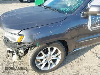 2015 Jeep Grand Cherokee Summit with VIN 1C4RJFJG0FC611768, listed as a IAAI auction lot 42468497 with 217,032 mi miles and . Bid and sale history available at DreamBid. Image 17.