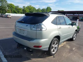 2006 Lexus RX 400h with VIN JTJHW31U360013349, listed as a IAAI auction lot 42614481 with 330,928 mi miles and . Bid and sale history available at DreamBid. Image 4.