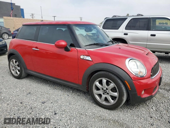 2009 MINI Hardtop S with VIN WMWMF73569TW82889, listed as a Copart auction lot 55630165 with 128,360 mi miles and Clean Title. Bid and sale history available at DreamBid. Image 4.