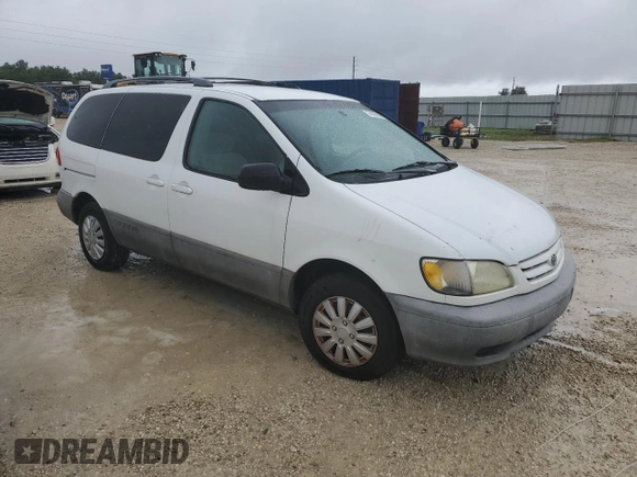 2001 Toyota Sienna LE with VIN 4T3ZF13C21U369506, listed as a Copart auction lot 74561634 with 0 mi miles and Salvage Title. Bid and sale history available at carsss.com. Image 4.