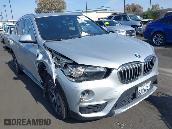 2019 BMW X1 xDrive28i with VIN WBXHT3C56K5L38658, listed as a IAAI auction lot 42496734 with 49,373 mi miles and . Bid and sale history available at DreamBid. Image 1.