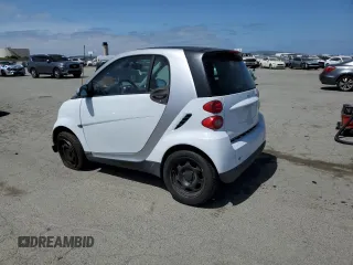 2012 Smart fortwo Pure z VIN WMEEJ3BA9CK561933, wystawiony jako Copart lot #53356835 z przebiegiem 67 587 mil mil oraz Nie do naprawy • Non repairable. Historia ofert i sprzedaży dostępna na DreamBid. Obrazek 2.