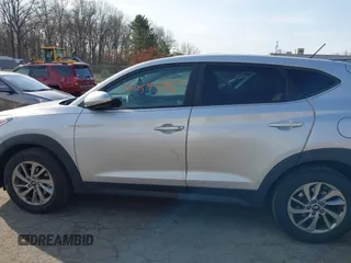 2018 Hyundai Tucson SE z VIN KM8J2CA44JU644303, wystawiony jako IAAI lot #42059326 z przebiegiem 67 873 mil mil oraz . Historia ofert i sprzedaży dostępna na DreamBid. Obrazek 14.