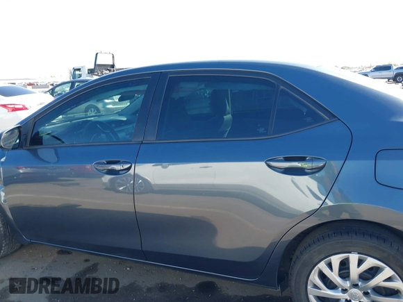 2019 Toyota Corolla L z VIN 2T1BURHE9KC217993, wystawiony jako IAAI lot #41844472 z przebiegiem 126 470 mil mil oraz . Historia ofert i sprzedaży dostępna na DreamBid. Obrazek 14.