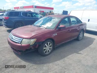 2008 Ford Taurus SEL z VIN 1FAHP24W68G132701, wystawiony jako IAAI lot #41928871 z przebiegiem 385 163 mil mil oraz . Historia ofert i sprzedaży dostępna na DreamBid. Obrazek 2.