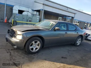2010 Dodge Charger with VIN 2B3CA4CD7AH217513, listed as a Copart auction lot 83057924 with 67,561 mi miles and Salvage Title. Bid and sale history available at carsss.com. Image 1.