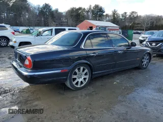 2004 Jaguar XJ with VIN SAJEA74C14SG01576, listed as a Copart auction lot 46955735 with 99,322 mi miles and Clean Title. Bid and sale history available at DreamBid. Image 3.