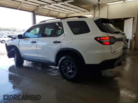 2025 Honda Pilot TrailSport z VIN 5FNYG1H67SB094346, wystawiony jako Copart lot #51415995 z przebiegiem 5 871 mil mil oraz Szkoda całkowita • Salvage title. Historia ofert i sprzedaży dostępna na DreamBid. Obrazek 2.