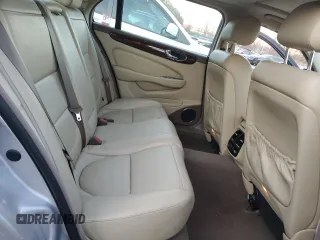 2005 Jaguar XJ with VIN SAJWA79C55SG37981, listed as a Copart auction lot 81142484 with 128,601 mi miles and Salvage Title. Bid and sale history available at carsss.com. Image 10.